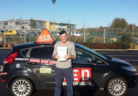 Gabriel Fell holding certificate