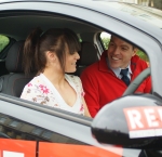 Learner and instructor in car