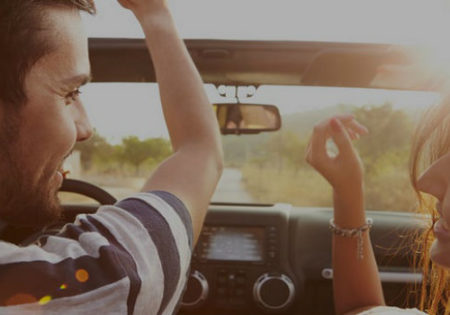 man and woman in car