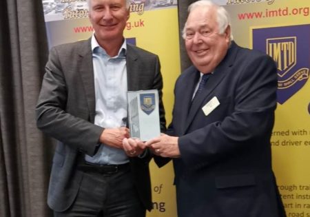 Ian Mcintosh accepting award