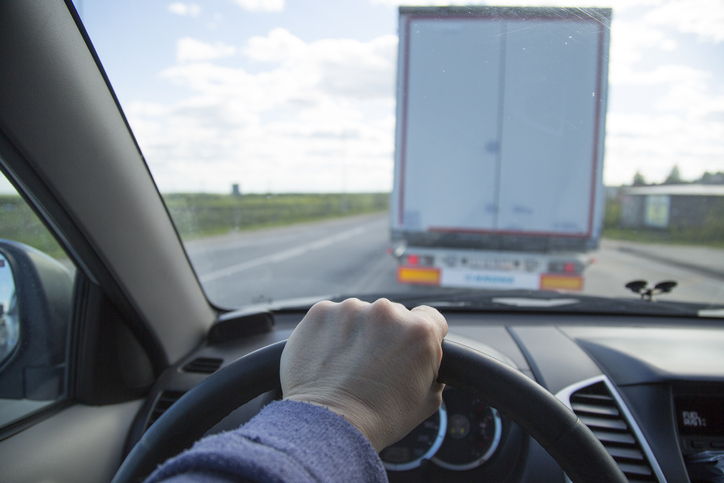 Driving a car on the freeway. Overtaking car.