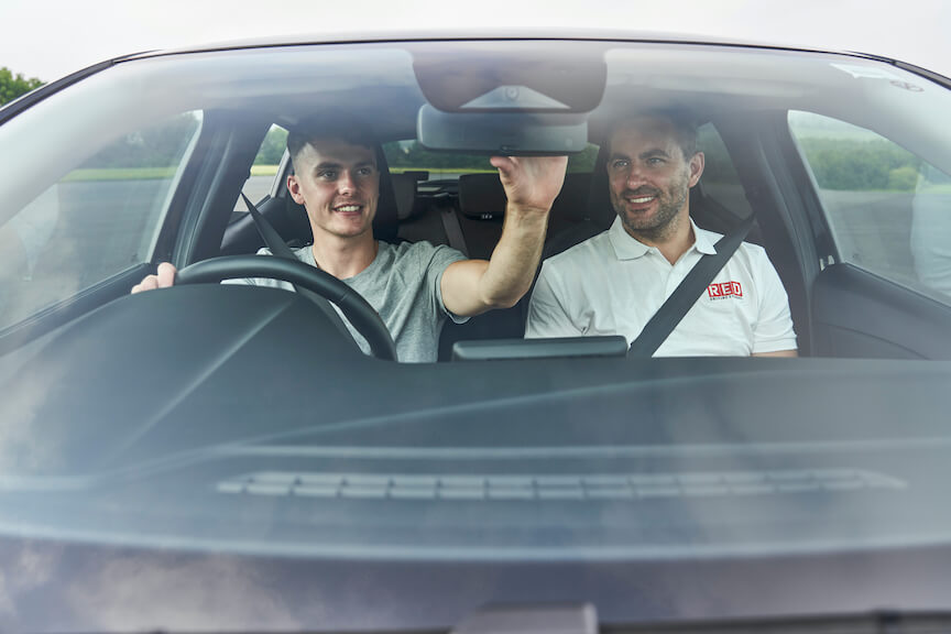 Male adjusting rear mirror