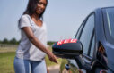 Female opening car door