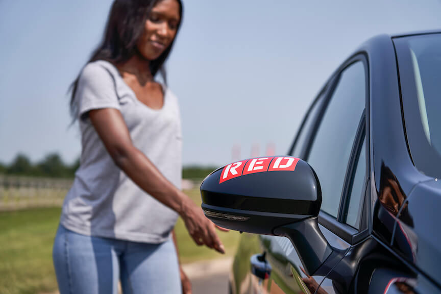 Female opening car door